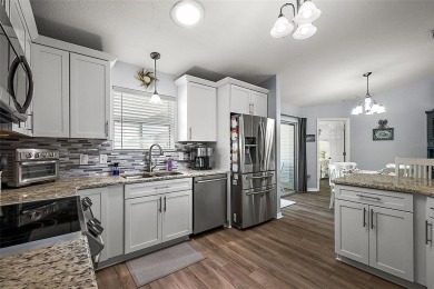 This charming Austin model in the village of AMELIA is ready for on Glenview Championship Golf and Country Club in Florida - for sale on GolfHomes.com, golf home, golf lot