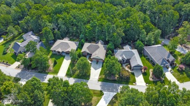 This very pretty brick and stone home is located in close on Heatherhurst Golf Course in Tennessee - for sale on GolfHomes.com, golf home, golf lot