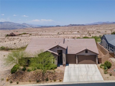 This pristine 2,008 square foot home backs up to the golf course on Laughlin Ranch Golf Club in Arizona - for sale on GolfHomes.com, golf home, golf lot