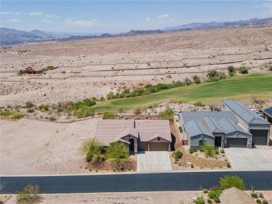 This pristine 2,008 square foot home backs up to the golf course on Laughlin Ranch Golf Club in Arizona - for sale on GolfHomes.com, golf home, golf lot