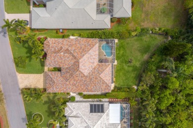 NEW ROOF! 2 New A/c units. 3 BRs & office w/ 3 baths & screened on Santa Lucia River Club in Florida - for sale on GolfHomes.com, golf home, golf lot