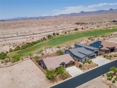 This pristine 2,008 square foot home backs up to the golf course on Laughlin Ranch Golf Club in Arizona - for sale on GolfHomes.com, golf home, golf lot