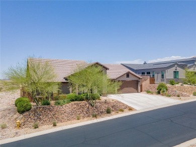 This pristine 2,008 square foot home backs up to the golf course on Laughlin Ranch Golf Club in Arizona - for sale on GolfHomes.com, golf home, golf lot
