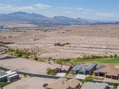 This pristine 2,008 square foot home backs up to the golf course on Laughlin Ranch Golf Club in Arizona - for sale on GolfHomes.com, golf home, golf lot