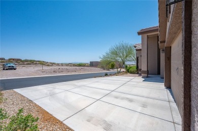 This pristine 2,008 square foot home backs up to the golf course on Laughlin Ranch Golf Club in Arizona - for sale on GolfHomes.com, golf home, golf lot