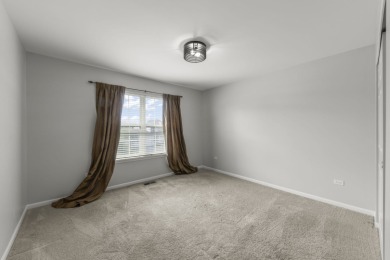 Welcome to this beautifully appointed 5-bedroom, 3.1 bath home on Bolingbrook Golf Club in Illinois - for sale on GolfHomes.com, golf home, golf lot