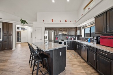 This pristine 2,008 square foot home backs up to the golf course on Laughlin Ranch Golf Club in Arizona - for sale on GolfHomes.com, golf home, golf lot