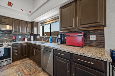 This pristine 2,008 square foot home backs up to the golf course on Laughlin Ranch Golf Club in Arizona - for sale on GolfHomes.com, golf home, golf lot