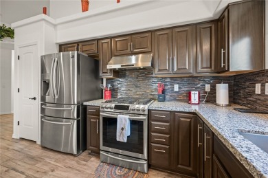 This pristine 2,008 square foot home backs up to the golf course on Laughlin Ranch Golf Club in Arizona - for sale on GolfHomes.com, golf home, golf lot