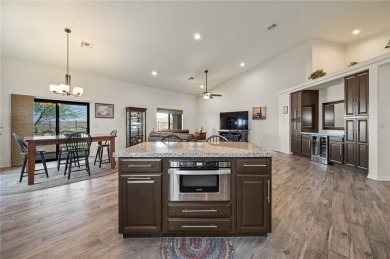 This pristine 2,008 square foot home backs up to the golf course on Laughlin Ranch Golf Club in Arizona - for sale on GolfHomes.com, golf home, golf lot