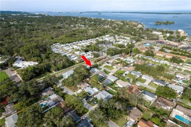 Meticulously maintained 2 bed, 2 bath Dunedin home featuring a on The Dunedin Country Club in Florida - for sale on GolfHomes.com, golf home, golf lot