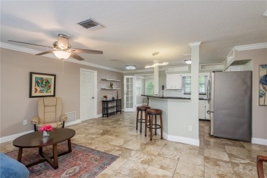 Meticulously maintained 2 bed, 2 bath Dunedin home featuring a on The Dunedin Country Club in Florida - for sale on GolfHomes.com, golf home, golf lot