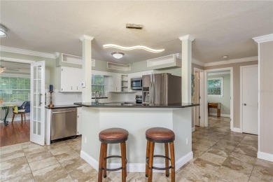 Meticulously maintained 2 bed, 2 bath Dunedin home featuring a on The Dunedin Country Club in Florida - for sale on GolfHomes.com, golf home, golf lot