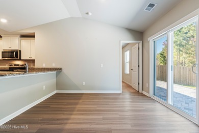 Step into this move-in ready 3 bedroom, 2 bath home built in on Lennon Hills Golf Course in North Carolina - for sale on GolfHomes.com, golf home, golf lot