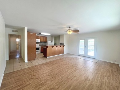 Nicely updated 3/2 brick home perched high for stunning views on Scott Schriener Municipal Golf Course in Texas - for sale on GolfHomes.com, golf home, golf lot