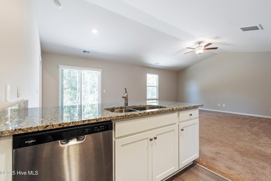 Step into this move-in ready 3 bedroom, 2 bath home built in on Lennon Hills Golf Course in North Carolina - for sale on GolfHomes.com, golf home, golf lot