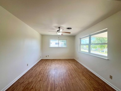 Nicely updated 3/2 brick home perched high for stunning views on Scott Schriener Municipal Golf Course in Texas - for sale on GolfHomes.com, golf home, golf lot