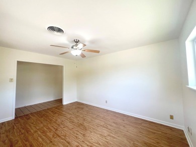 Nicely updated 3/2 brick home perched high for stunning views on Scott Schriener Municipal Golf Course in Texas - for sale on GolfHomes.com, golf home, golf lot