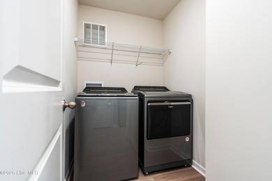 Step into this move-in ready 3 bedroom, 2 bath home built in on Lennon Hills Golf Course in North Carolina - for sale on GolfHomes.com, golf home, golf lot