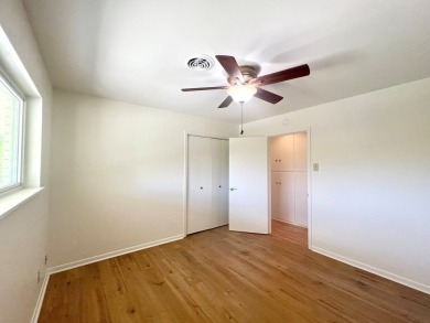 Nicely updated 3/2 brick home perched high for stunning views on Scott Schriener Municipal Golf Course in Texas - for sale on GolfHomes.com, golf home, golf lot