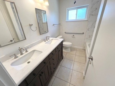 Nicely updated 3/2 brick home perched high for stunning views on Scott Schriener Municipal Golf Course in Texas - for sale on GolfHomes.com, golf home, golf lot