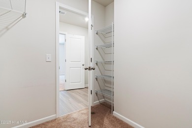 Step into this move-in ready 3 bedroom, 2 bath home built in on Lennon Hills Golf Course in North Carolina - for sale on GolfHomes.com, golf home, golf lot