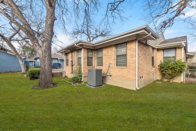 This solid built home sits amongst the huge trees of Kessler on Stevens Park Golf Course in Texas - for sale on GolfHomes.com, golf home, golf lot