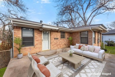 This solid built home sits amongst the huge trees of Kessler on Stevens Park Golf Course in Texas - for sale on GolfHomes.com, golf home, golf lot