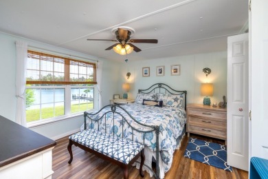 Immaculate 3BR, 2BA Lake Marion waterfront home with spectacular on Players Course At Wyboo Plantation in South Carolina - for sale on GolfHomes.com, golf home, golf lot