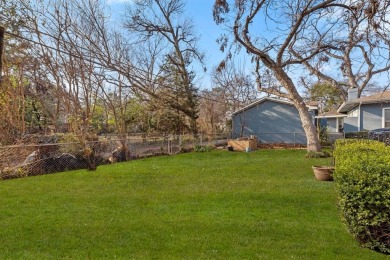 This solid built home sits amongst the huge trees of Kessler on Stevens Park Golf Course in Texas - for sale on GolfHomes.com, golf home, golf lot