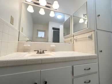 Nicely updated 3/2 brick home perched high for stunning views on Scott Schriener Municipal Golf Course in Texas - for sale on GolfHomes.com, golf home, golf lot