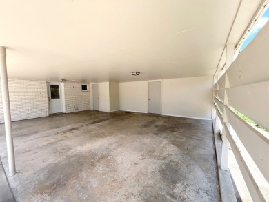 Nicely updated 3/2 brick home perched high for stunning views on Scott Schriener Municipal Golf Course in Texas - for sale on GolfHomes.com, golf home, golf lot