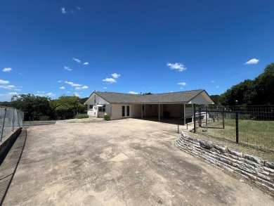 Nicely updated 3/2 brick home perched high for stunning views on Scott Schriener Municipal Golf Course in Texas - for sale on GolfHomes.com, golf home, golf lot