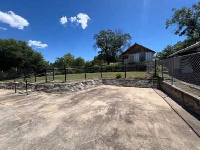 Nicely updated 3/2 brick home perched high for stunning views on Scott Schriener Municipal Golf Course in Texas - for sale on GolfHomes.com, golf home, golf lot