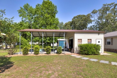 Immaculate 3BR, 2BA Lake Marion waterfront home with spectacular on Players Course At Wyboo Plantation in South Carolina - for sale on GolfHomes.com, golf home, golf lot
