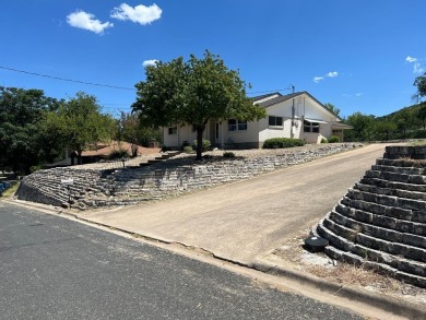 Nicely updated 3/2 brick home perched high for stunning views on Scott Schriener Municipal Golf Course in Texas - for sale on GolfHomes.com, golf home, golf lot