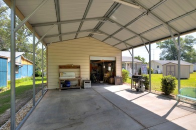 Immaculate 3BR, 2BA Lake Marion waterfront home with spectacular on Players Course At Wyboo Plantation in South Carolina - for sale on GolfHomes.com, golf home, golf lot