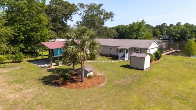 Immaculate 3BR, 2BA Lake Marion waterfront home with spectacular on Players Course At Wyboo Plantation in South Carolina - for sale on GolfHomes.com, golf home, golf lot