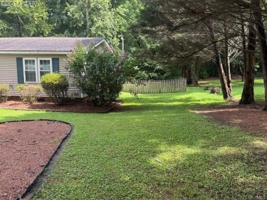 I am pleased to present an exceptional property located directly on South Hill Country Club in Virginia - for sale on GolfHomes.com, golf home, golf lot