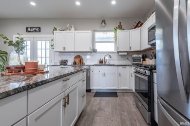 This 3-bedroom, 2-bath home on 1 acre sits across from Rolling on Rolling Meadows Golf Course in Indiana - for sale on GolfHomes.com, golf home, golf lot