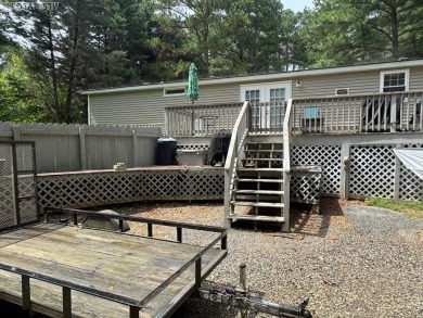 I am pleased to present an exceptional property located directly on South Hill Country Club in Virginia - for sale on GolfHomes.com, golf home, golf lot