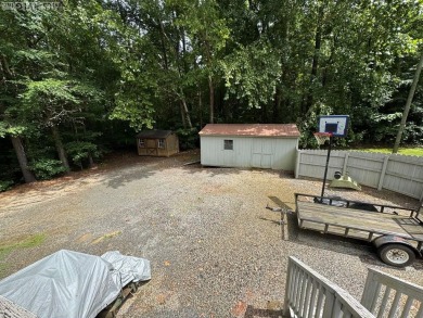 I am pleased to present an exceptional property located directly on South Hill Country Club in Virginia - for sale on GolfHomes.com, golf home, golf lot