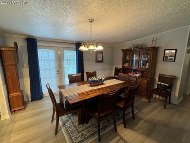 I am pleased to present an exceptional property located directly on South Hill Country Club in Virginia - for sale on GolfHomes.com, golf home, golf lot