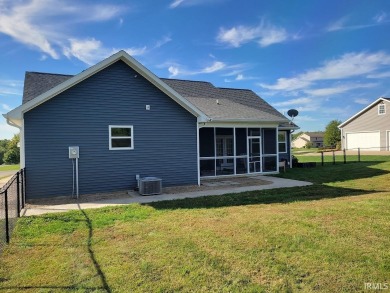 This 3-bedroom, 2-bath home on 1 acre sits across from Rolling on Rolling Meadows Golf Course in Indiana - for sale on GolfHomes.com, golf home, golf lot