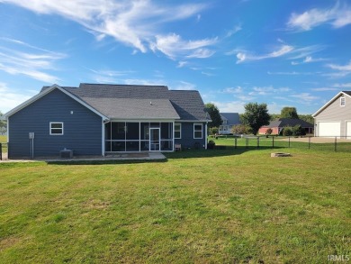 This 3-bedroom, 2-bath home on 1 acre sits across from Rolling on Rolling Meadows Golf Course in Indiana - for sale on GolfHomes.com, golf home, golf lot