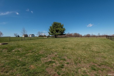 This 3-bedroom, 2-bath home on 1 acre sits across from Rolling on Rolling Meadows Golf Course in Indiana - for sale on GolfHomes.com, golf home, golf lot