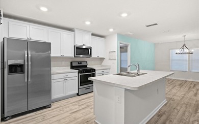 Located in the golf-cart-friendly Grand Reserve Golf Community on Grand Reserve Golf Course in Florida - for sale on GolfHomes.com, golf home, golf lot