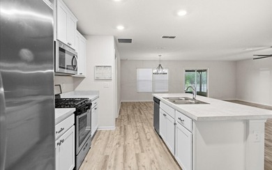 Located in the golf-cart-friendly Grand Reserve Golf Community on Grand Reserve Golf Course in Florida - for sale on GolfHomes.com, golf home, golf lot