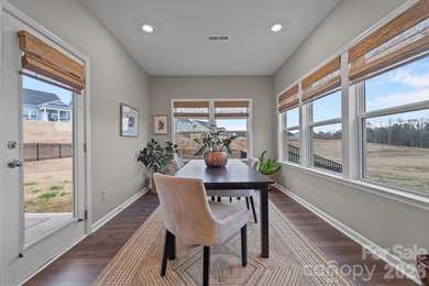 This stunning home features an open floor plan with a fantastic on The Tillery Tradition Country Club in North Carolina - for sale on GolfHomes.com, golf home, golf lot