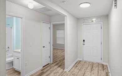 Located in the golf-cart-friendly Grand Reserve Golf Community on Grand Reserve Golf Course in Florida - for sale on GolfHomes.com, golf home, golf lot